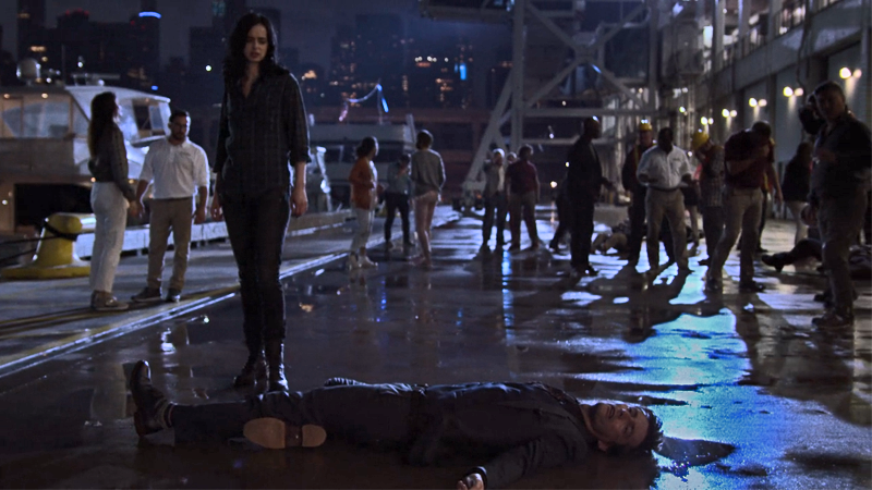 Jessica Jones (Krysten Ritter) stands over the fresh corpse of Kilgrave (David Tennant) in “A.K.A. Smile”, the finale of Jessica Jones’ first season.